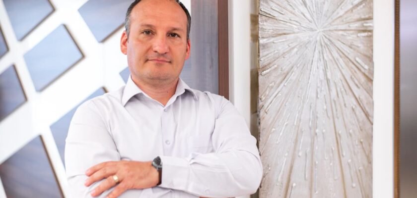 Teodor Stoica, Genesis Property